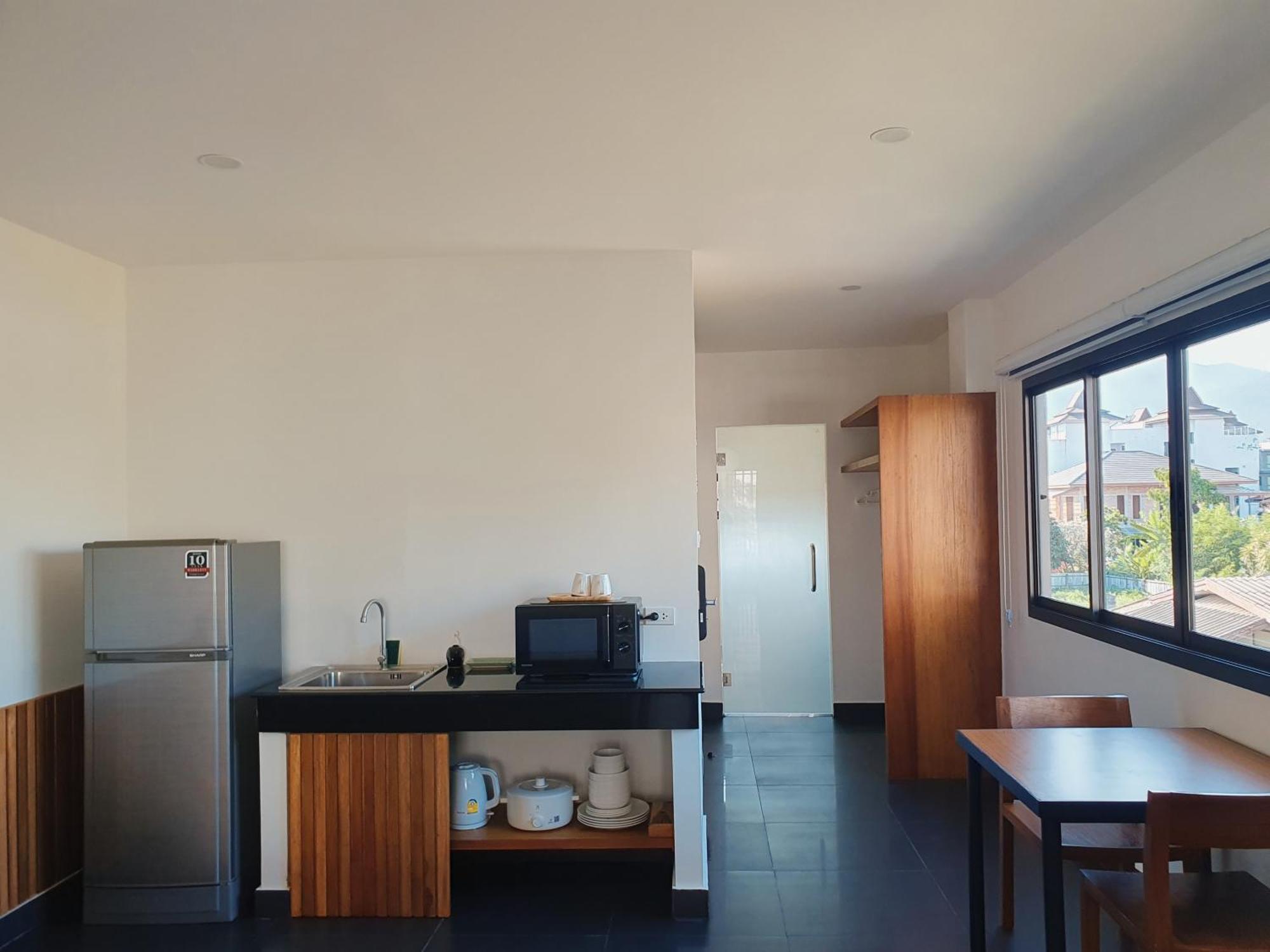The Sila Suites - Intrawarorot Chiang Mai Bagian luar foto